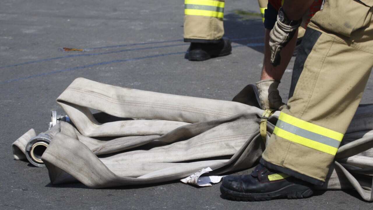 Fire and police emergency services at the scene of a fire