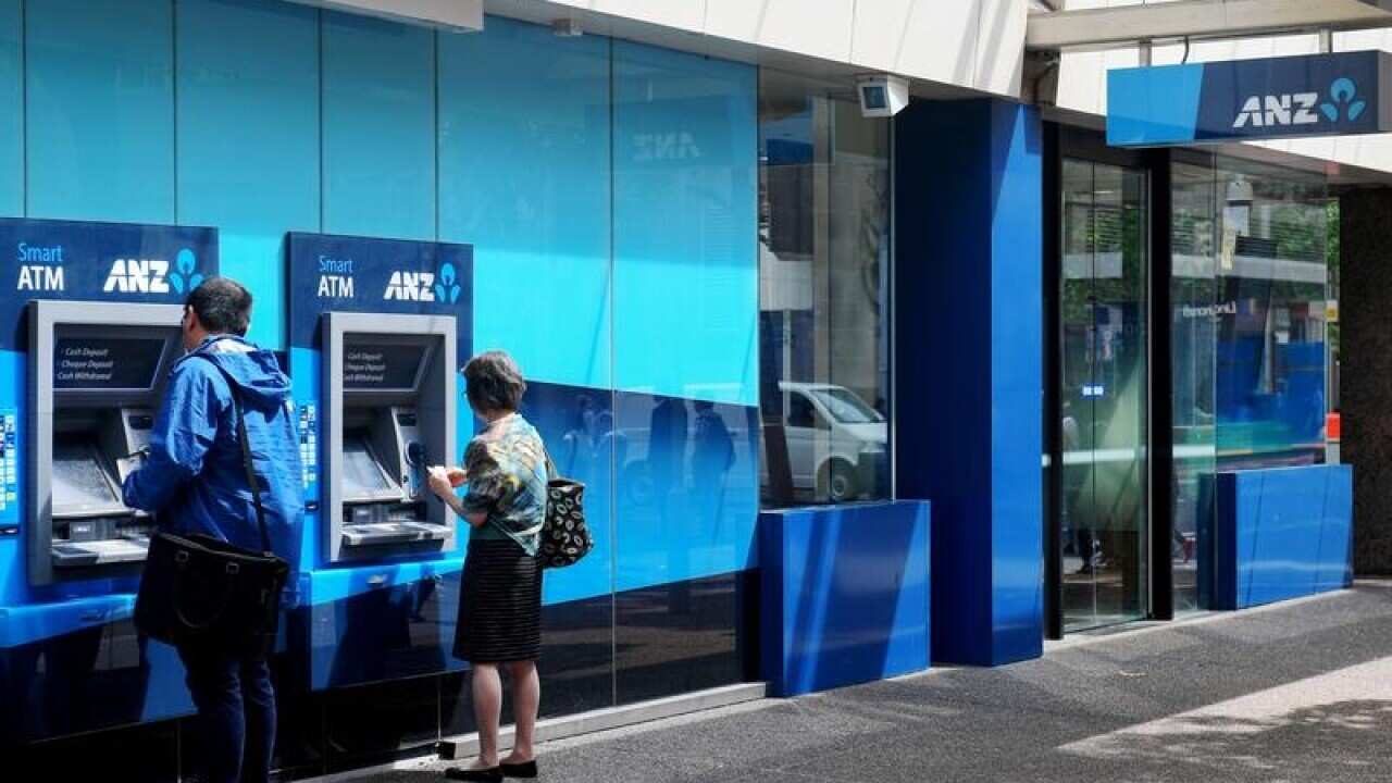 Customers use an ANZ ATM in Sydney