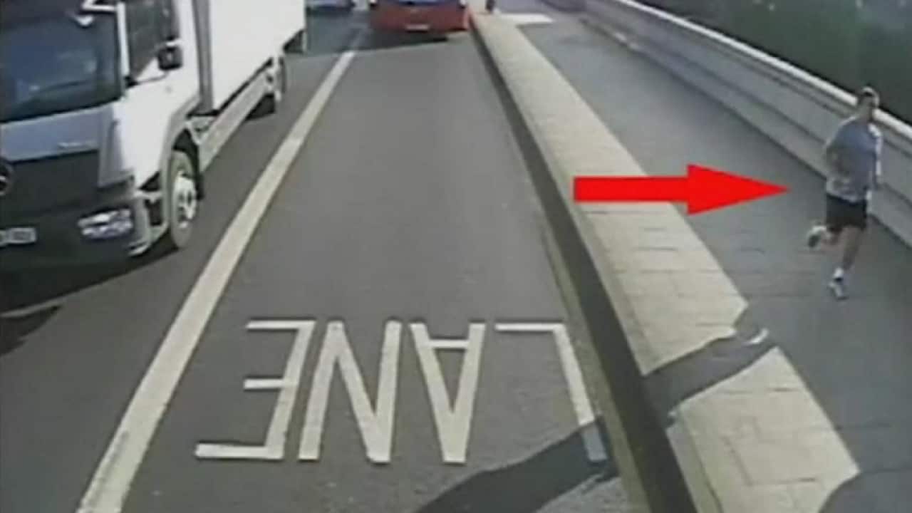 Jogger knocks woman into bus's path in London
