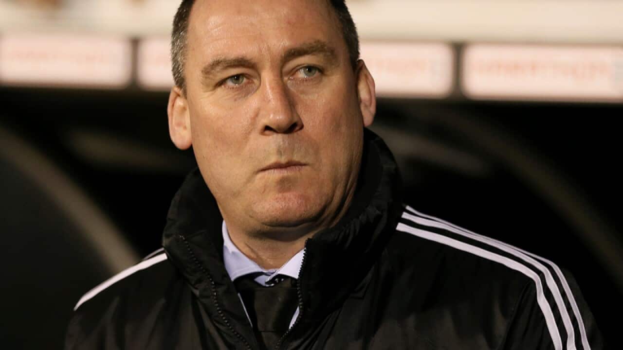 Outgoing Fulham soccer club manager Rene Meulensteen looks on.