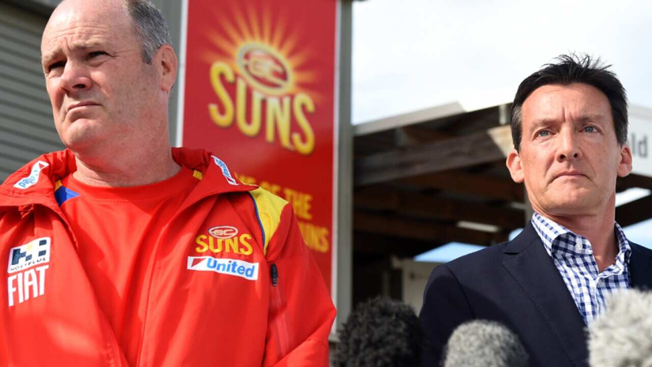 Gold Coast Suns Coach Rodney Eade and the club's CEO Andrew Travis.