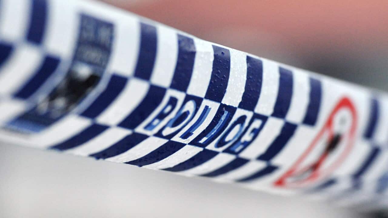 Police tape restricts access to a crime scene north of Sydney