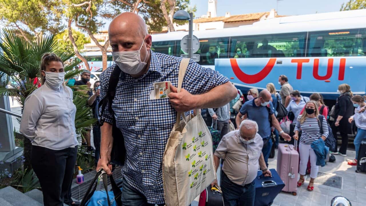German tourists arrive in Palma de Mallorca, Balearics Islands, Spain