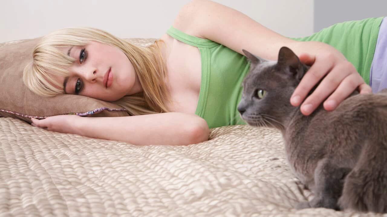 Teenage girl at home