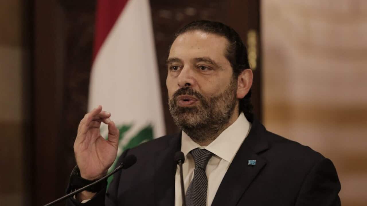 Lebanese Prime Minister Saad Hariri speaks during an address to the nation, in Beirut, Lebanon, Friday, Oct. 18, 2019.