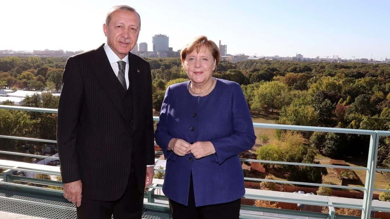 German Chancellor Angela Merkel, right, and Turkish President Recep Tayyip Erdogan.