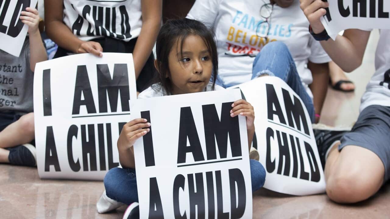 Children and families stage a sit-in at Capitol Hill in Washington, DC.