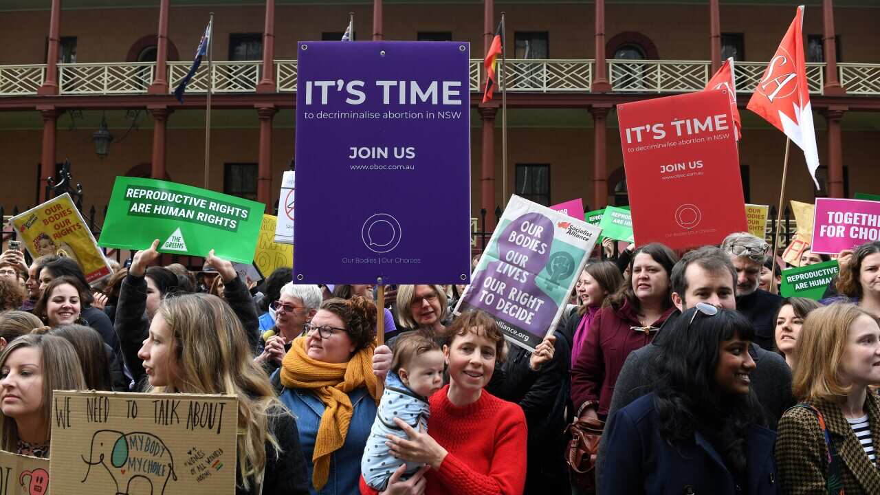 Pro choice advocates and supporters of the Reproductive Health Care Reform Bill outside NSW parliament.