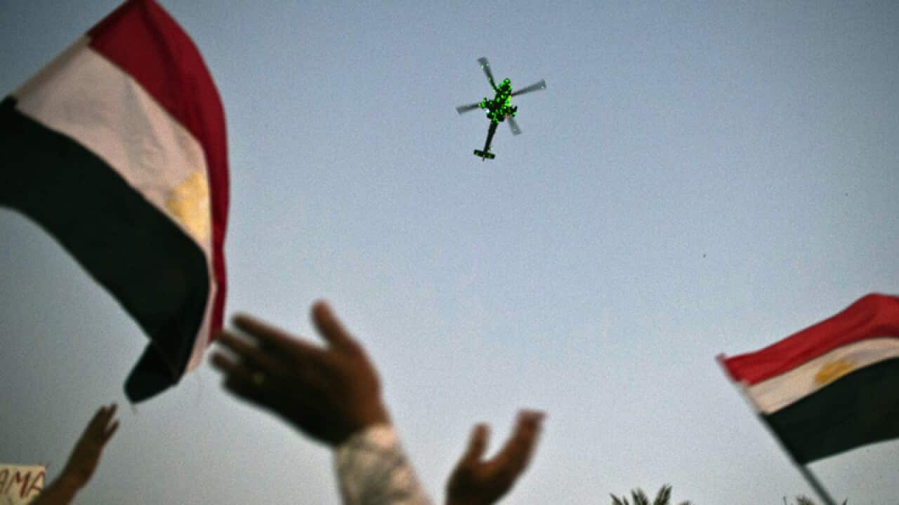 Egyptians throng Tahrir in support of army