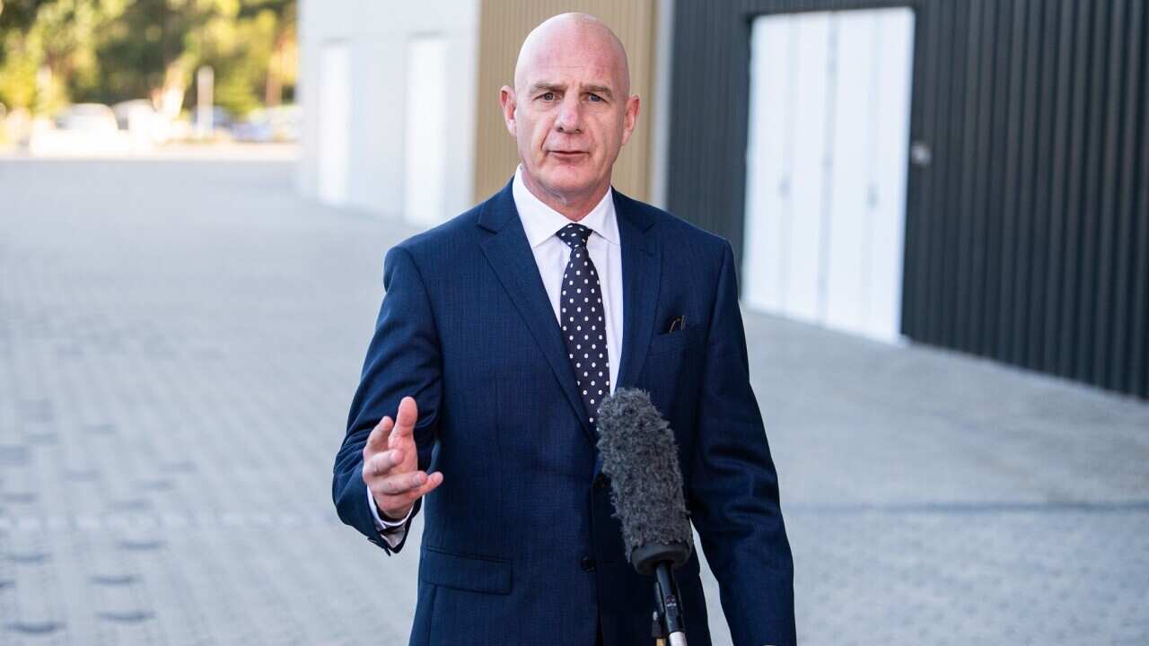 Premier of Tasmania Peter Gutwein speaking to media
