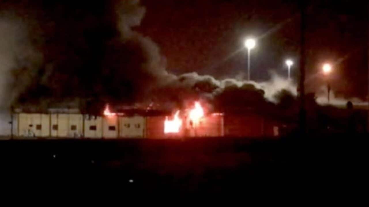 Video footage posted online by the Nine Network showed a section of the centre well alight and thick smoke billowing.