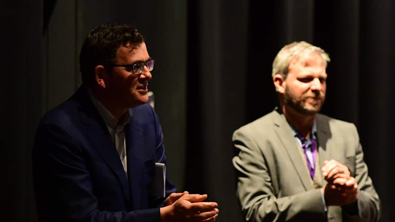 Dan Andrews and Brett Sutton appear at the Victorian press conference