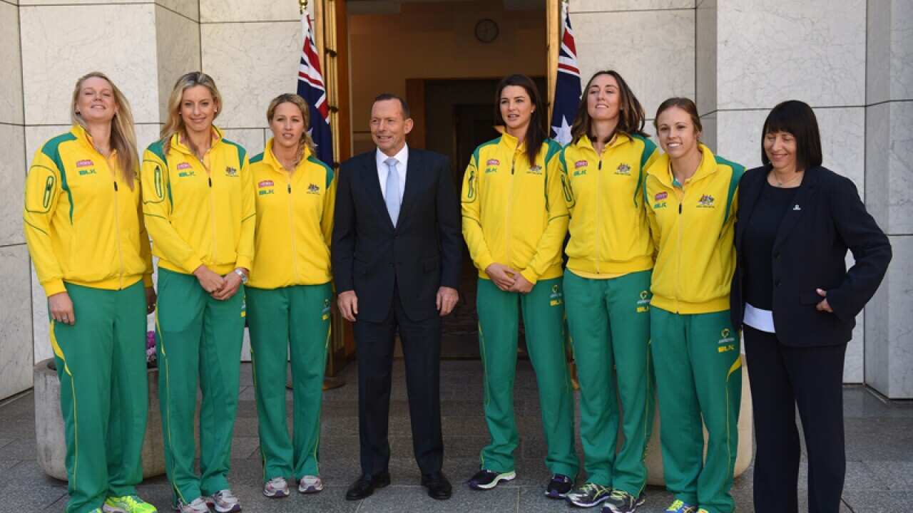 Tony Abbott with members of the Australian Diamonds