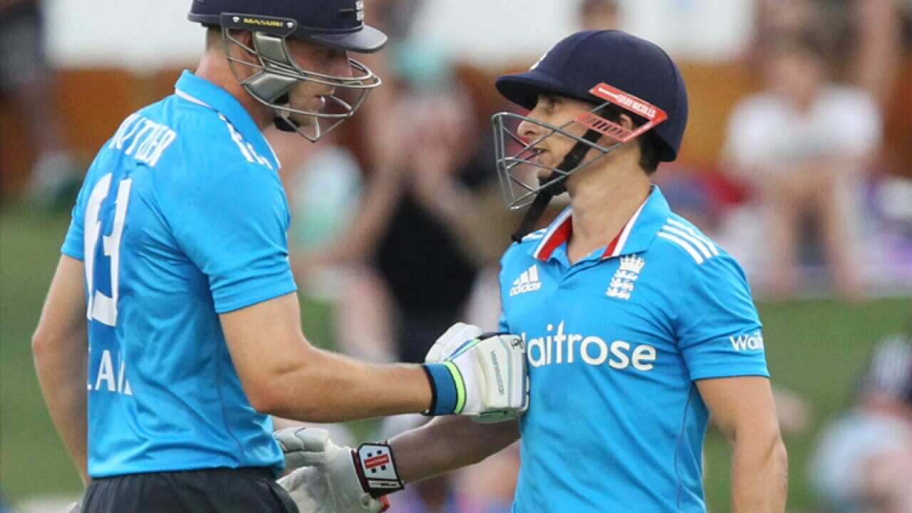England batsmen Jos Buttler (L) and James Taylor