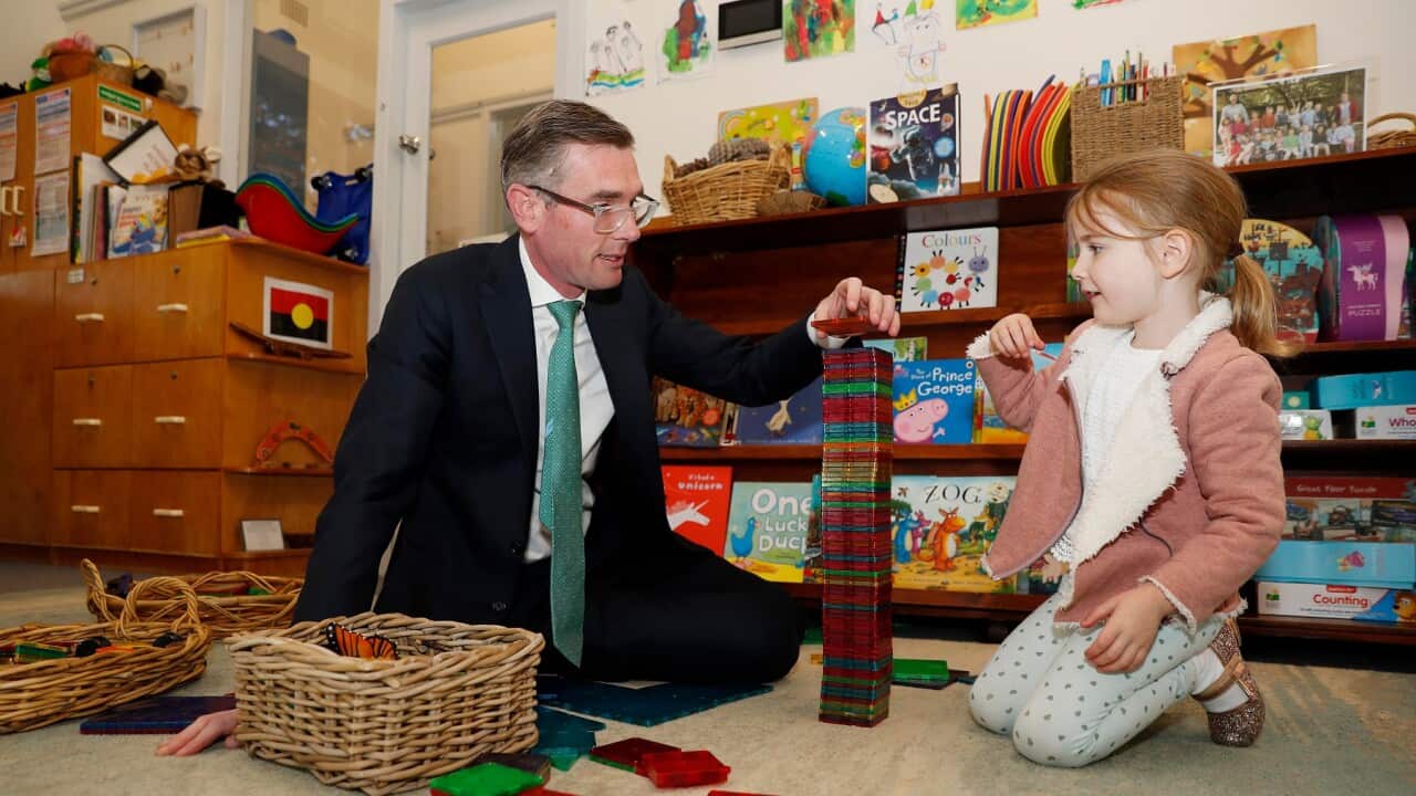 NSW Premier Dominic Perrottet plays with his daughter Harriet at Cheltenham Memorial Preschool in Sydney, Thursday, June 16, 2022. (AAP Image/Pool, Nikki Short) NO ARCHIVING