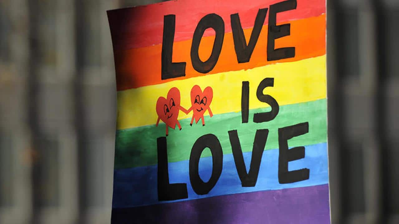 Supporters attend a marriage equality rally in Sydney.