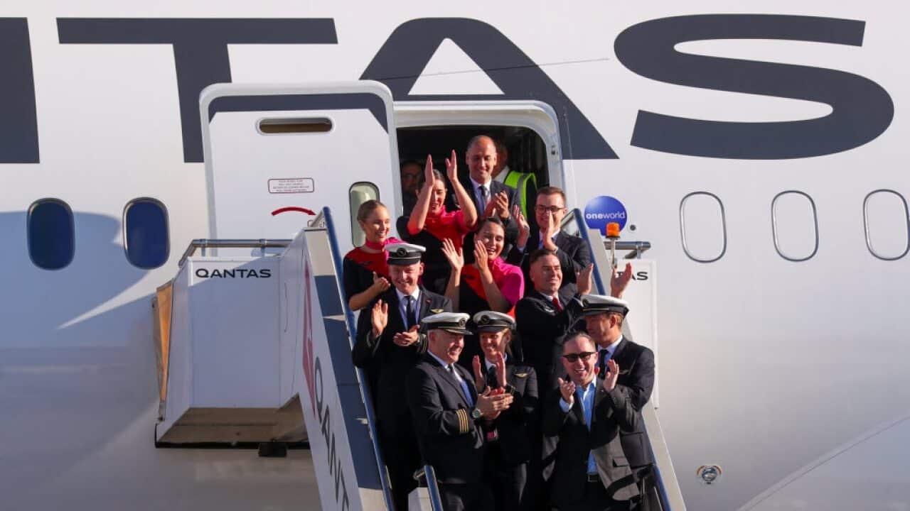 Alan Joyce, Qantas Group CEO with the flight deck crew and cabin crew at Sydney Airport
