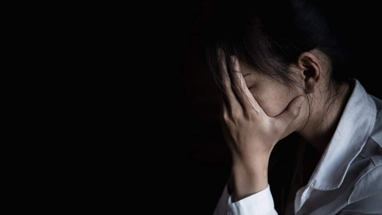 Young woman suffering from a severe depression