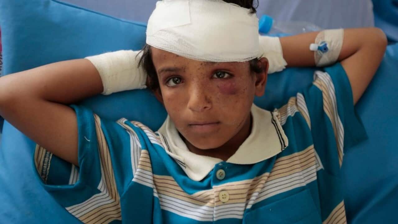 A child injured in a deadly Saudi-led coalition airstrike on Thursday rests in a hospital in Saada, Yemen, Sunday, Aug. 12, 2018. Y(AP Photo/Hani Mohammed)