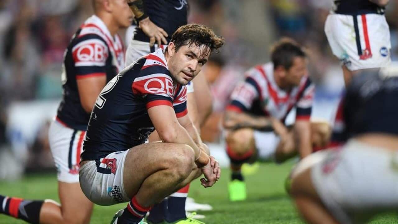 Aidan Guerra crouching down