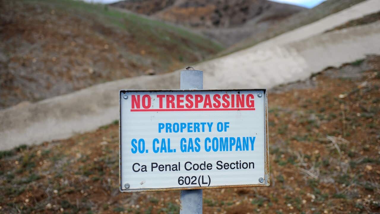  sign declares the boundary line of the Southern California Gas Co. gas fields where a gas well has been leaking methane daily near the community of Porter Ranch in Los Angeles. (AP)