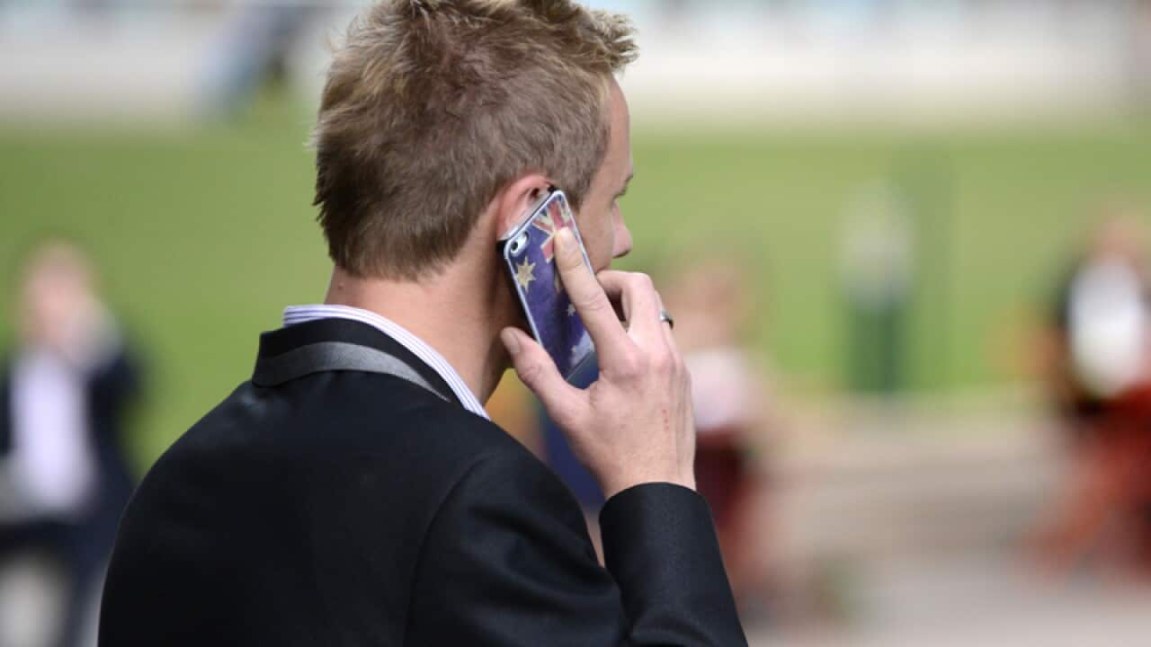 A man talks on his mobile phone in Brisbane
