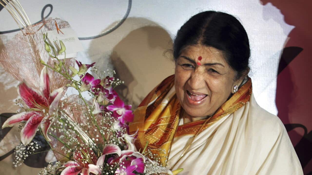 Singer Lata Mangeshkar laughs at the launch of her hindi music album 'Saadgi' or Simplicity, on World Music Day, in Mumbai, India, Thursday, June 21, 2007. Mangeshkar has released a music album after a gap of 17 years. (AP Photo/Rajesh Nirgude)