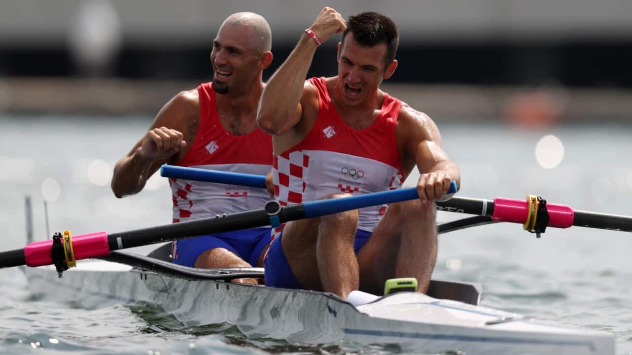 TOKYO, JAPAN - JULY 29: Gold medalists Martin Sinkovic and Valent Sinkovic of Team Croatia celebrate after winning the gold medal in the Men's Pair Final A on day six of the Tokyo 2020 Olympic Games at Sea Forest Waterway on July 29, 2021 in Tokyo, Japan.
