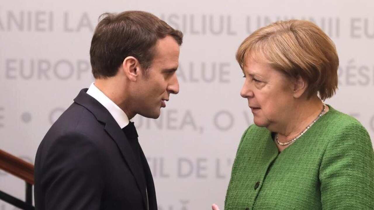 German Chancellor Angela Merkel with French President Emmanuel Macron.
