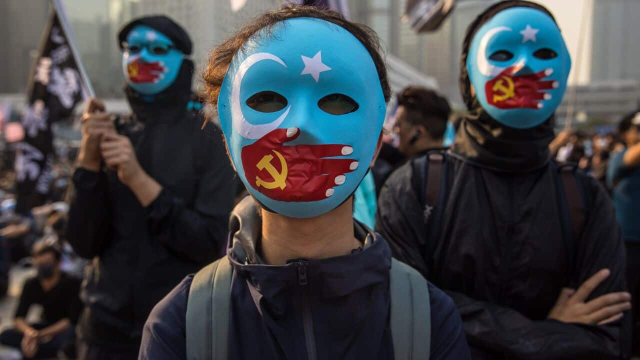 Protesters attend a rally in Hong Kong in 2019 to show their support for the Uighur minority in China
