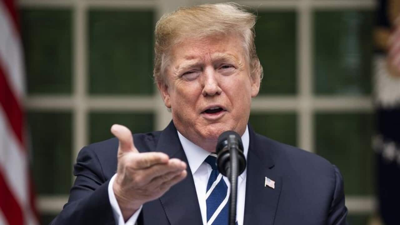 President Donald Trump talks to the media.