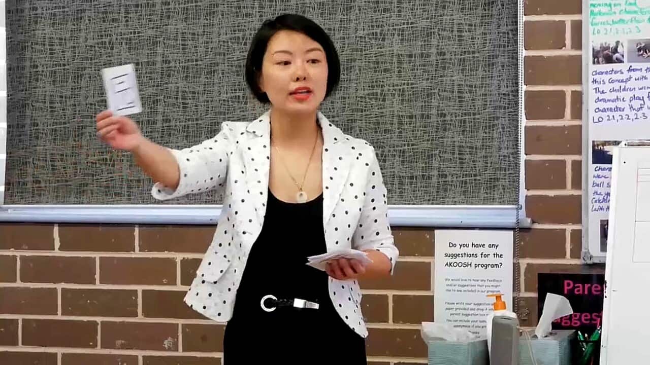 Yong Fei teaching in class