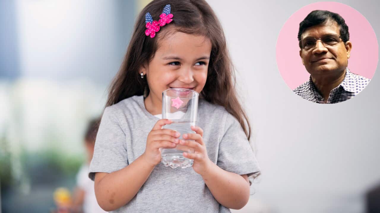 Smiling cute girl holding glass of water at home (AAP); Inset: Mr M Thayanithi