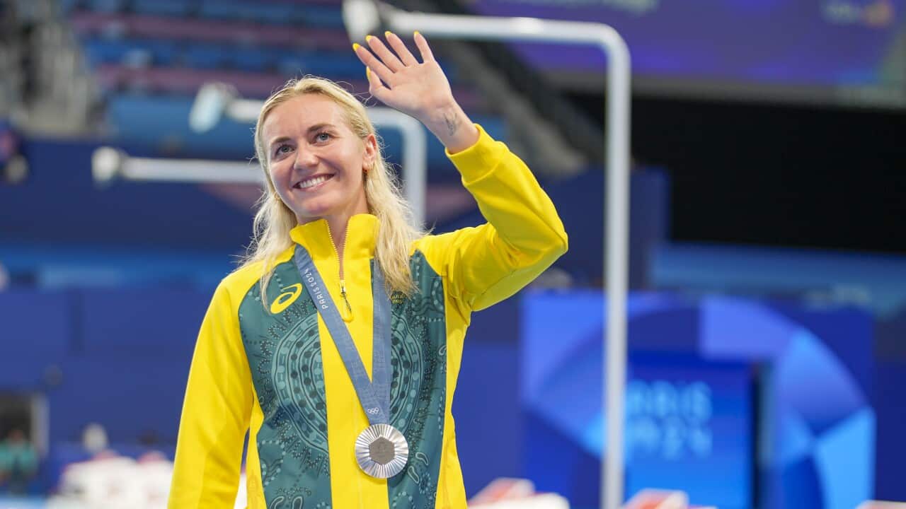 Ariarne Titmus of Australia show her Silver Medal during the Women's 800m Medals Ceremony on day eight of the Olympic Games Paris 2024 at Paris La Defense Arena