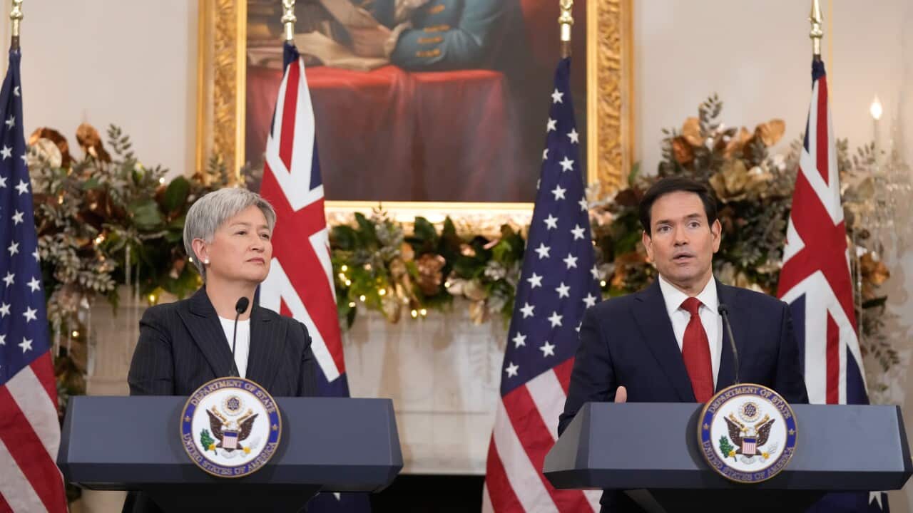 Marco Rubio and Penny Wong standing at podiums in the White House.