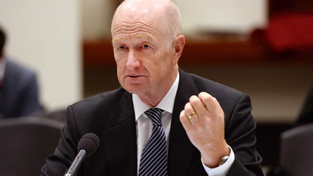 Glenn Stevens gives an address.