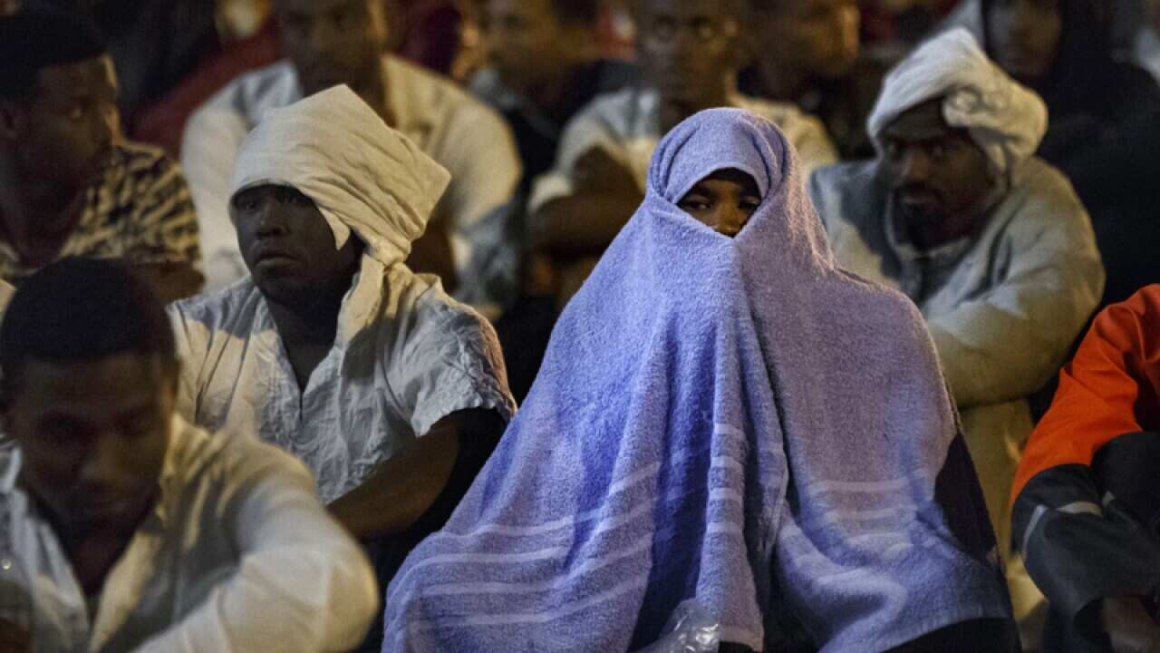Migrants after being rescued in the Mediterranean Sea
