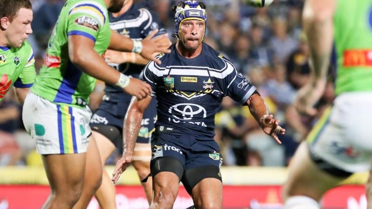 Cowboys co-captain Johnathan Thurston in action against the Raiders.