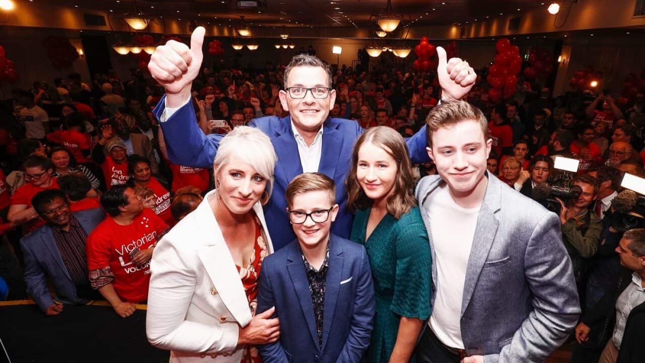 Premier Daniel Andrews (top) poses for a photo with his family during the Labor Party reception on Victorian State election night in Melbourne, Saturday, November 24, 2018. (AAP Image/Daniel Pockett) NO ARCHIVING