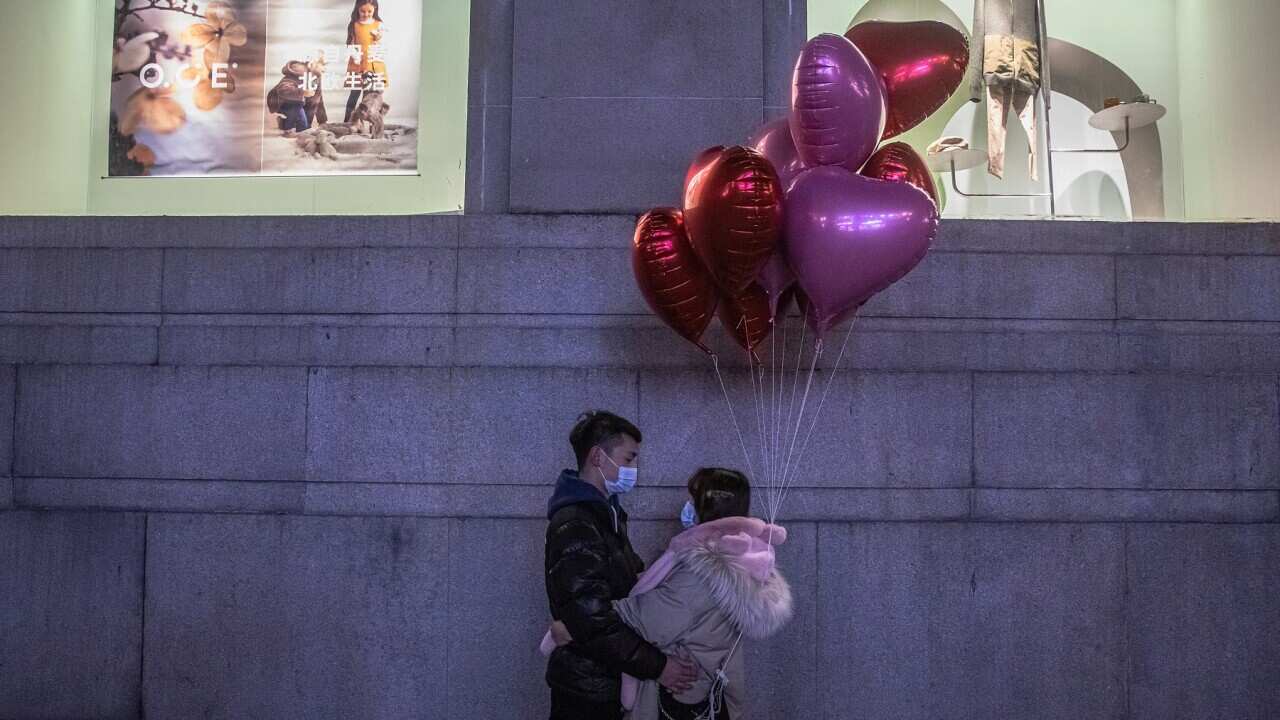 A couple on New Year’s Eve in Wuhan (AAP)