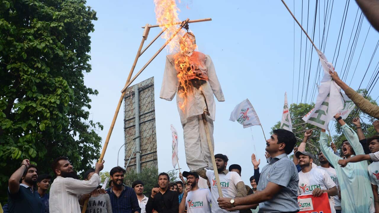 Activists of Youth Forum for Kashmir burns Indian PM Modi effigy in reaction to the move by India to abolish Kashmir's special status. 