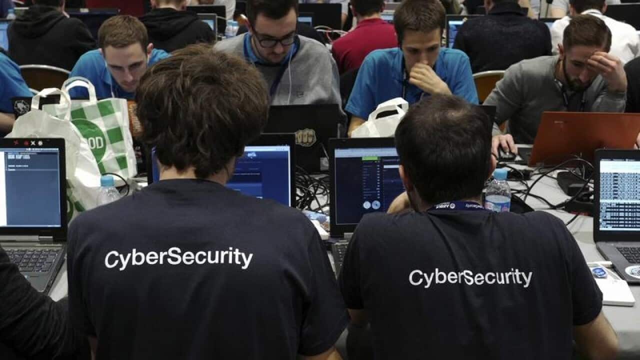 Hackers take part to a test at the Cybersecurity Conference in France
