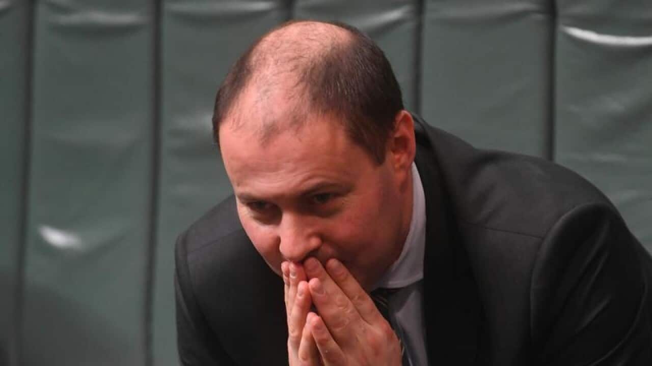 Josh Frydenberg reacts during House of Representatives Question Time.
