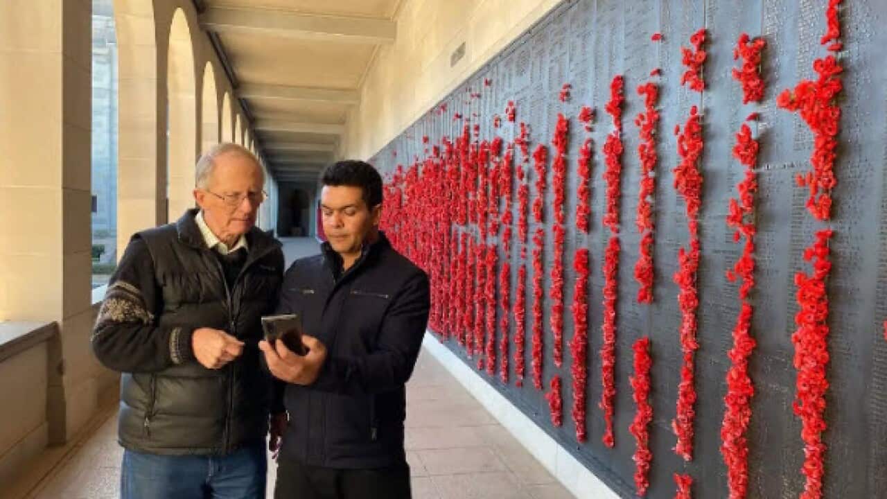 Hugh Poate meeting Farid Raman for the first time at the Australian War Memorial in Canberra (SBS).jpeg