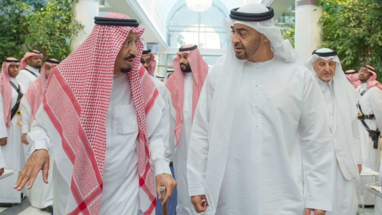 Saudi King Salman bin Abdulaziz Al Saud, left, talks to Sheikh Mohammed bin Zayed Al Nahyan, Abu Dhabi's Crown Prince