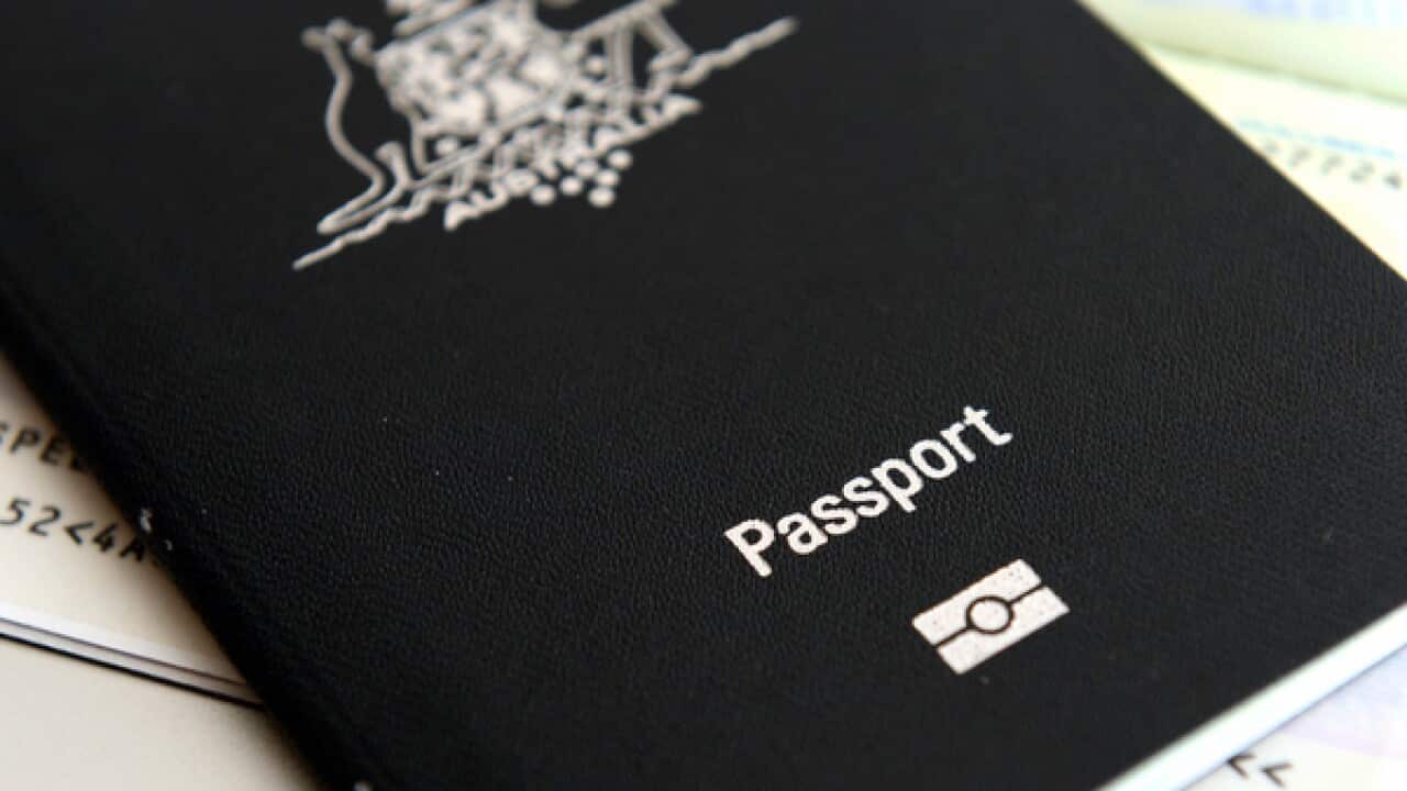An Australian passport pictured in Brisbane, Thursday, July 25, 2013. (AAP Image/Dan Peled) NO ARCHIVING