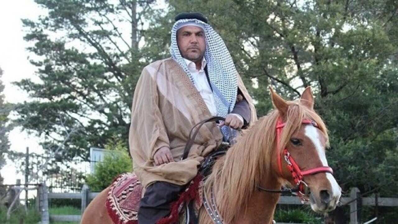 Hazim Al Temimi on horse Final.jpg