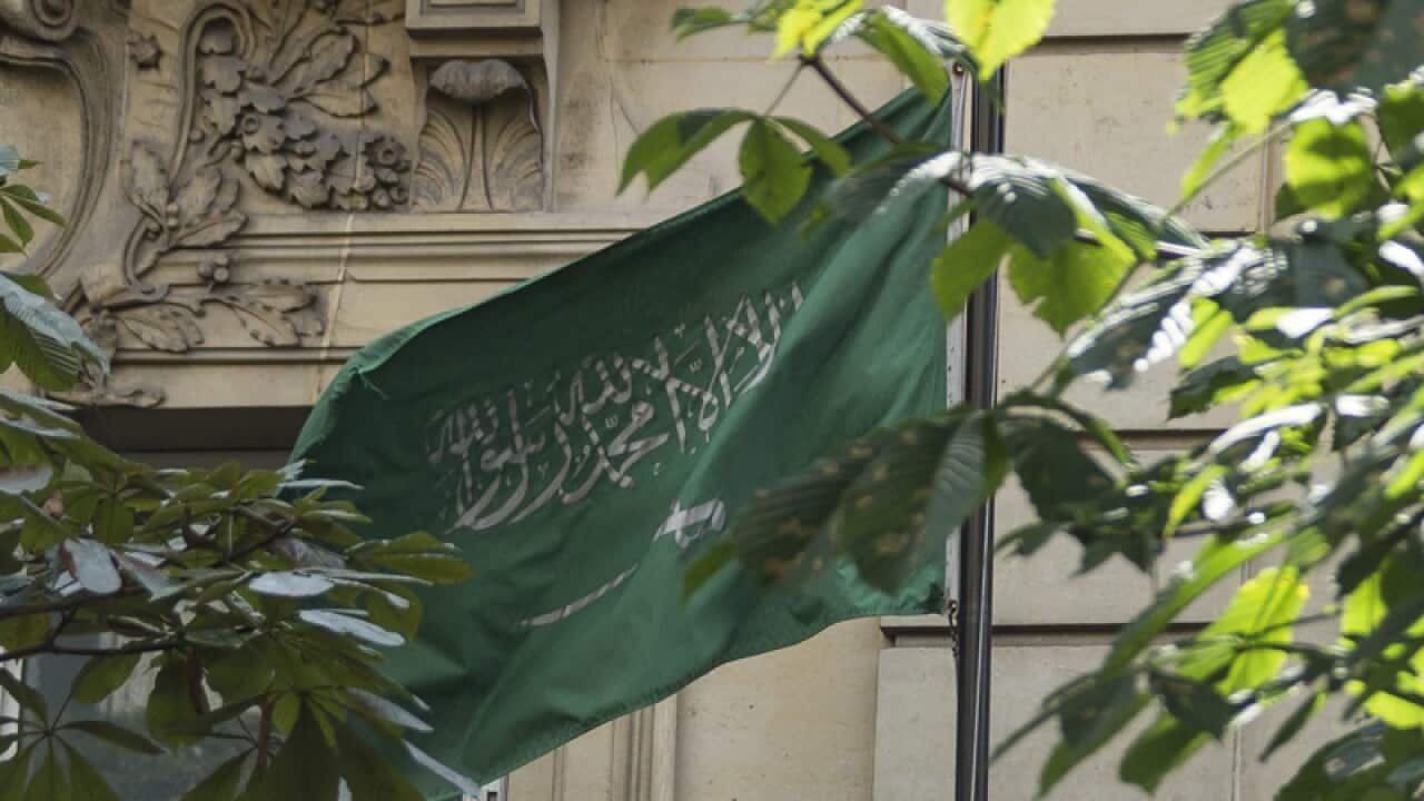 A Saudi Arabian flag outside an embassy building