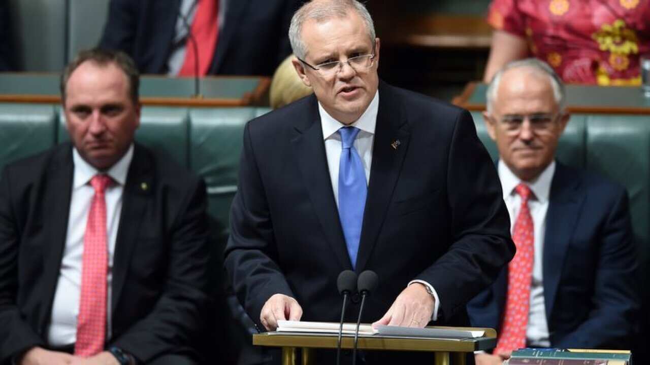 Australian Federal Treasurer Scott Morrison speaks at the despatch box during the delivery of the 2016-17 Federal Budget in the House of Representatives at Parliament House