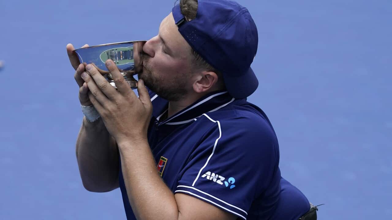 Dylan Alcottcelebrates after defeating Niels Vink during the men's wheelchair quad singles final at the US Open in New York, 12 September, 2021. 